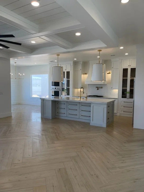 A green-cabinet study with a crystal chandelier — a home worth refinancing into.